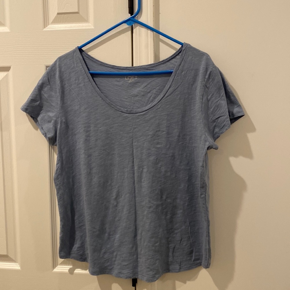 Scoop neck blue t-shirt.